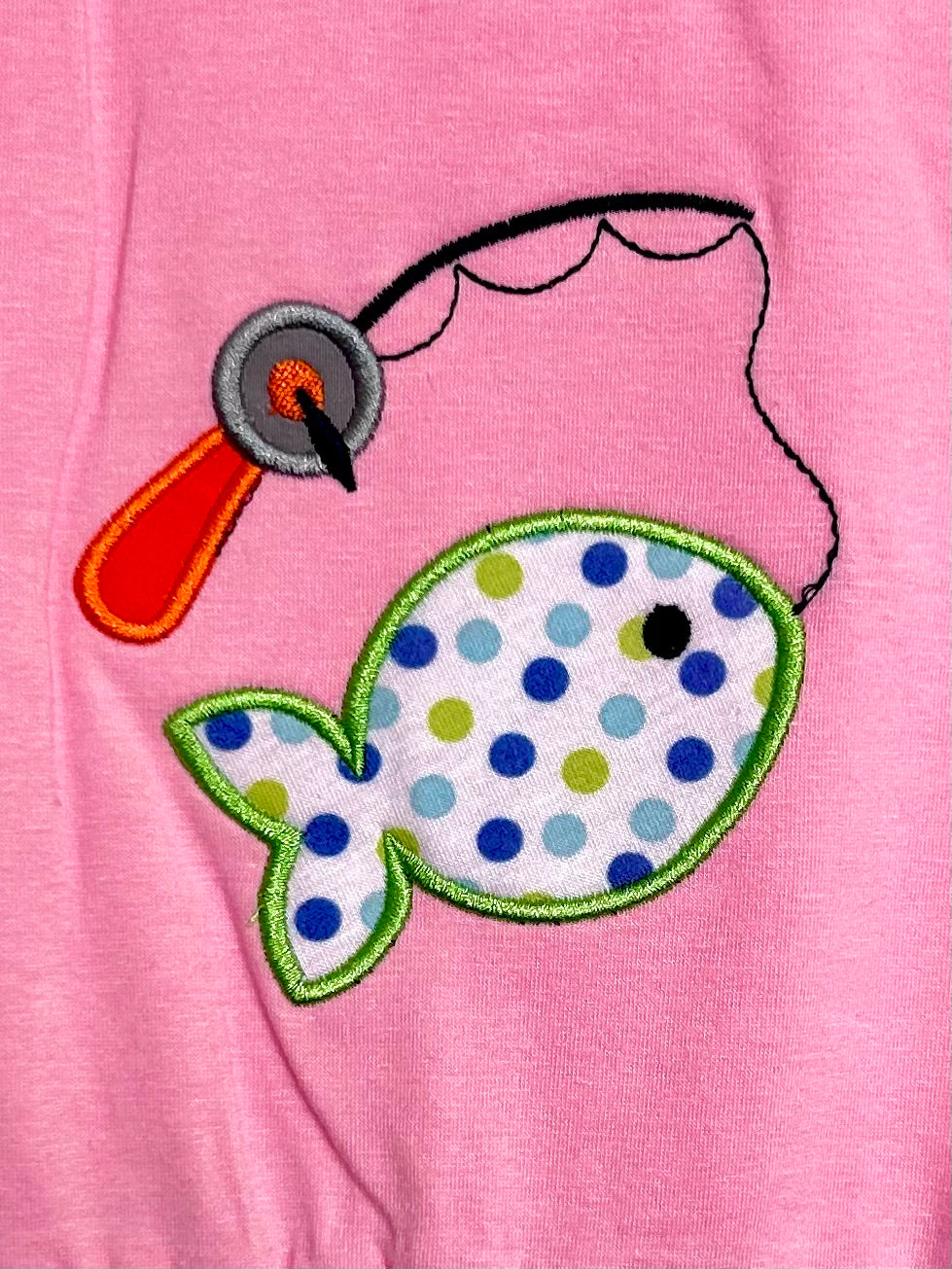 Pink and Polka Dots Catching Fish
