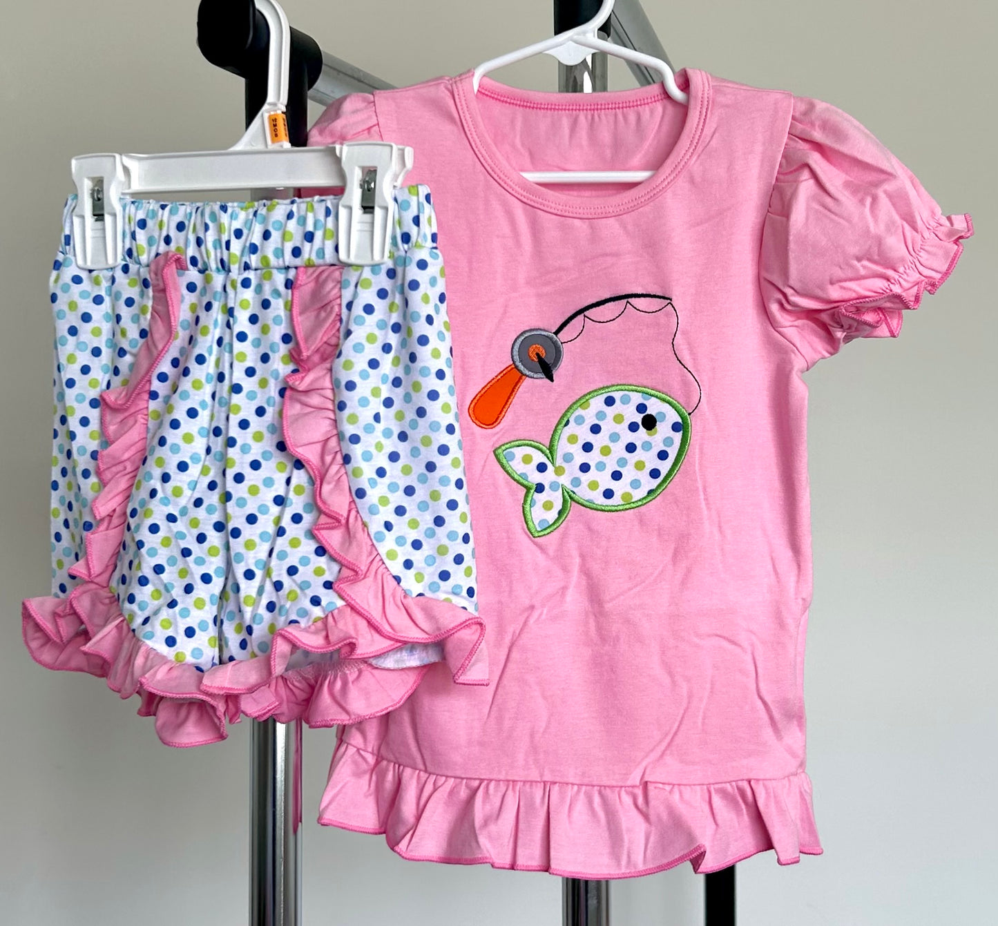 Pink and Polka Dots Catching Fish